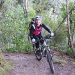 Olivia mountain biking the Heaphy Track