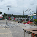 The aftermath of the typhoon that ripped through and destroyed the media tent at the World Games
